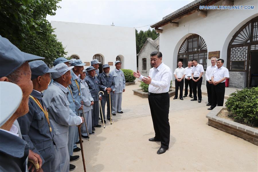 El presidente de China, Xi Jinping, dijo que debe hacerse más para acabar con la pobreza y mejorar los estándares de vida en áreas de bases revolucionarias.(Xinhua/Pang Xinglei)