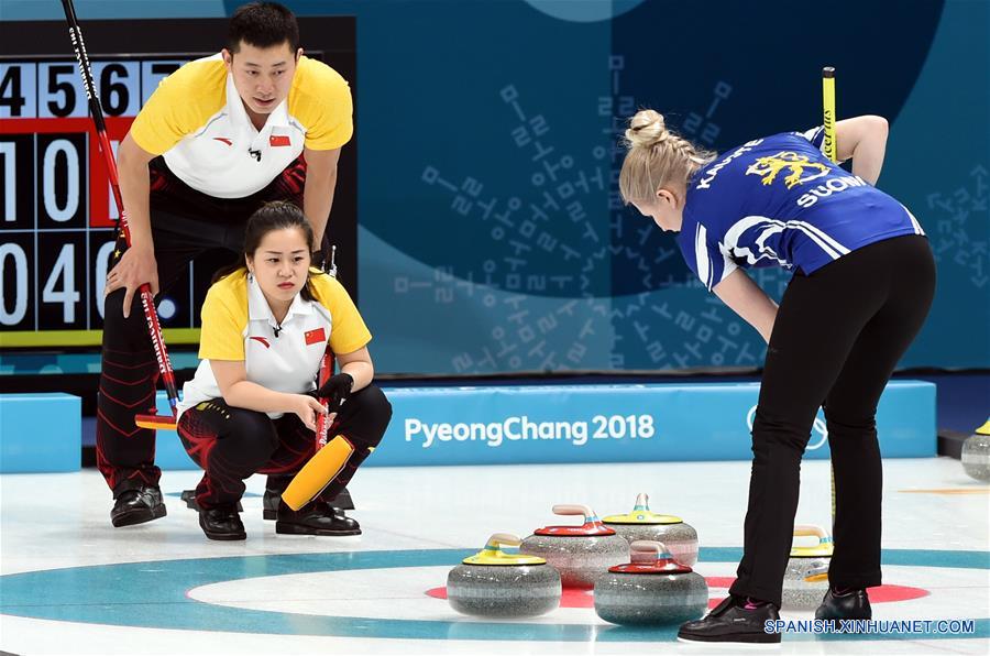 China vence a Finlandia en curling doble mixto in PyeongChang Games mixed doubles curling