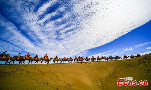 La ‘a(chǎn)rena que canta’ atrae a más turistas en Gansu