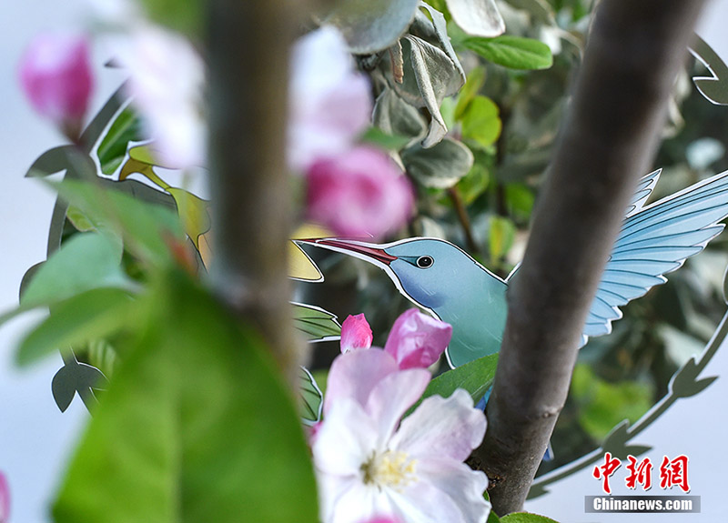 El arte chino del papel recortado ensalza la hermosa primavera