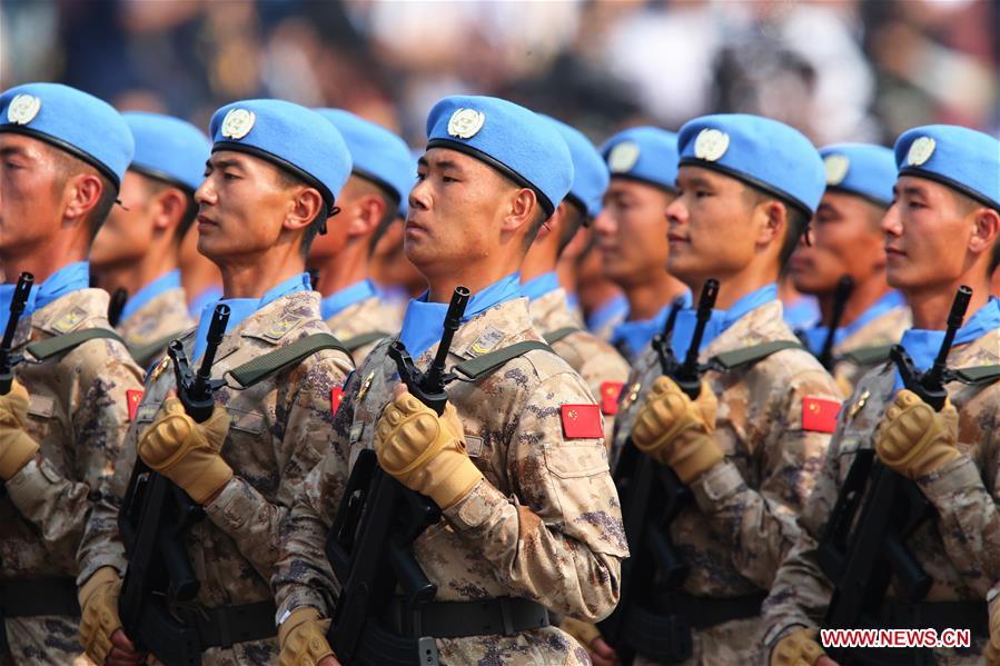 (Día Nacional) Debutan fuerzas chinas de pacificación en desfile del Día nacional