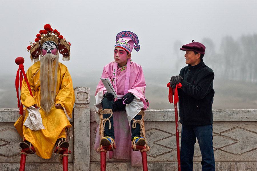 Pausa durante las jornadas de Shehuo. [Foto: Wu Xiaopeng/cpanet.org.cn]