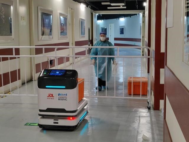 La foto muestra un robot logístico en el Centro Deportivo de Wukesong. (Foto / Yangcheng Evening News)