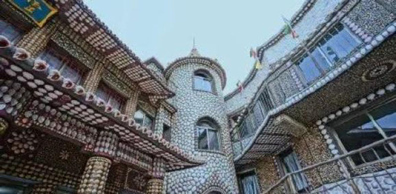 Una vista exterior de la casa con temática de conchas. (Foto / thepaper.cn)