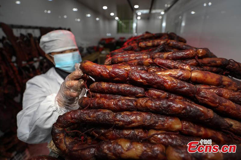 El aroma a carne curada rebosa en Guizhou